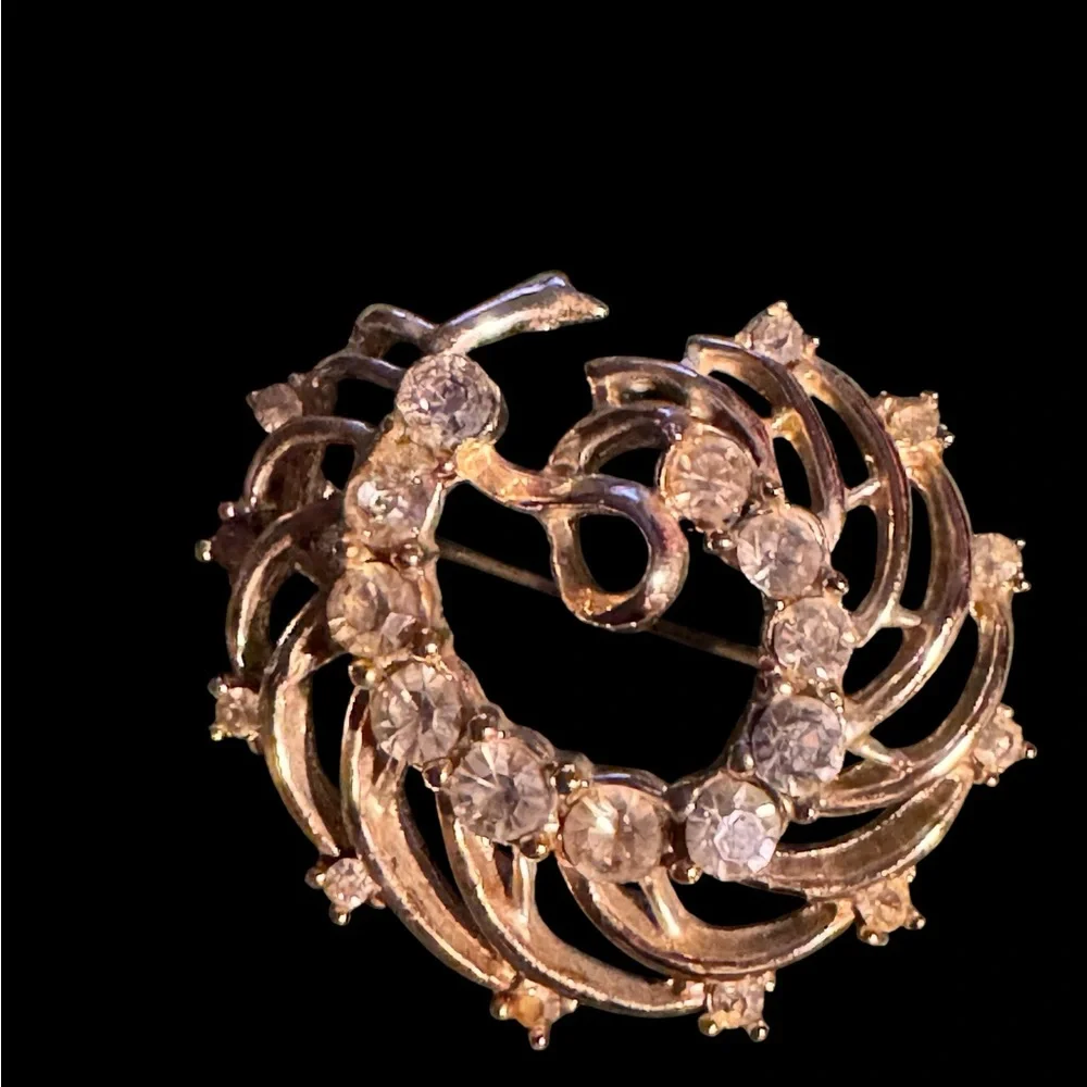 Two crystal brooches